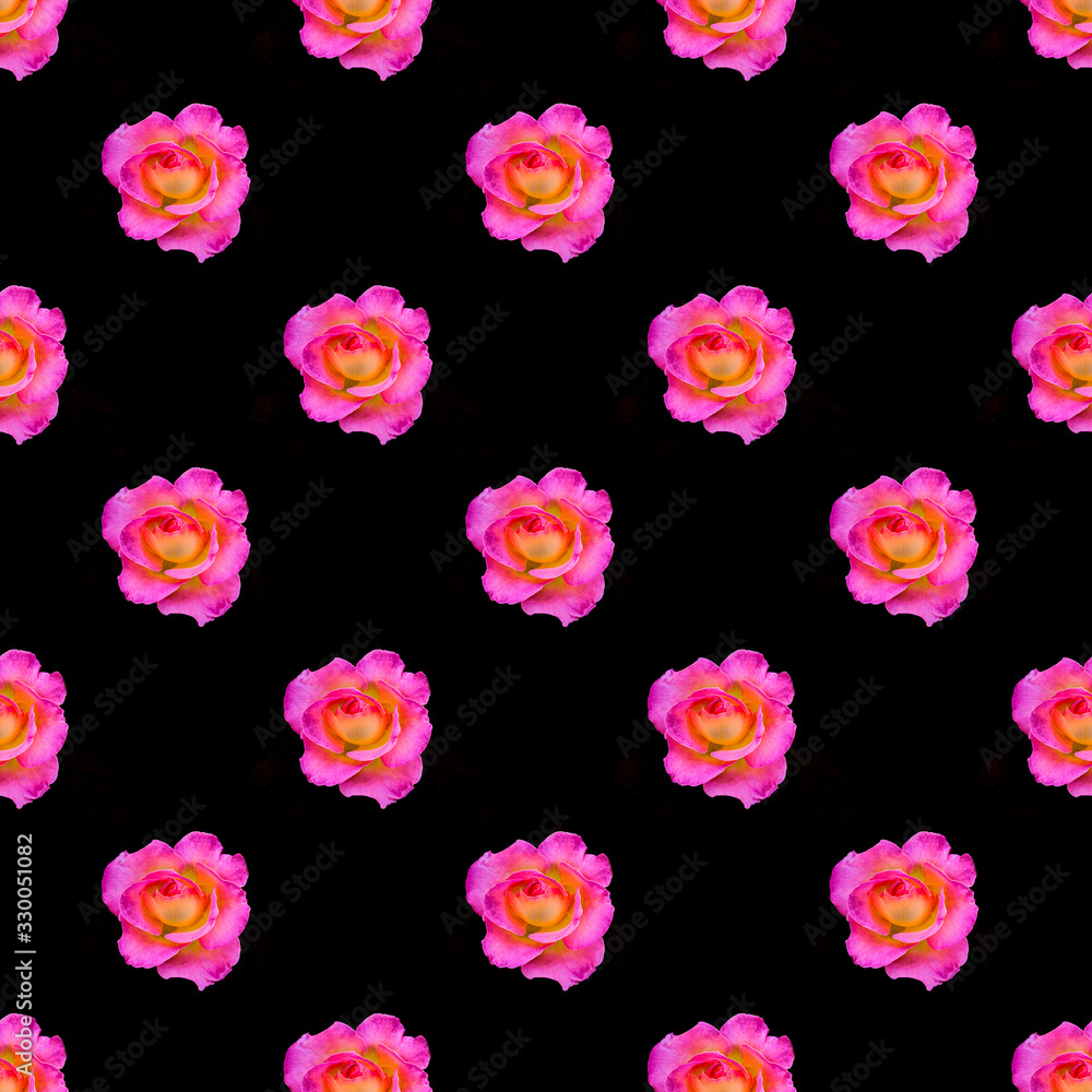 Pink roses flowers on abstract black background. Flat lay, top view. Seamless floral pattern.