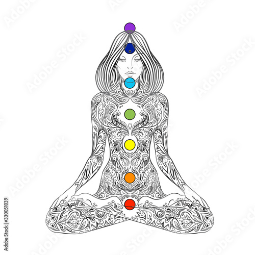 Yoga. Woman ornate silhouette sitting in lotus pose over ornamental flower, ethnic art. Meditation, kundalini, tantra, ayurveda, aura and chakras. Vector illustration. Isolated on white.