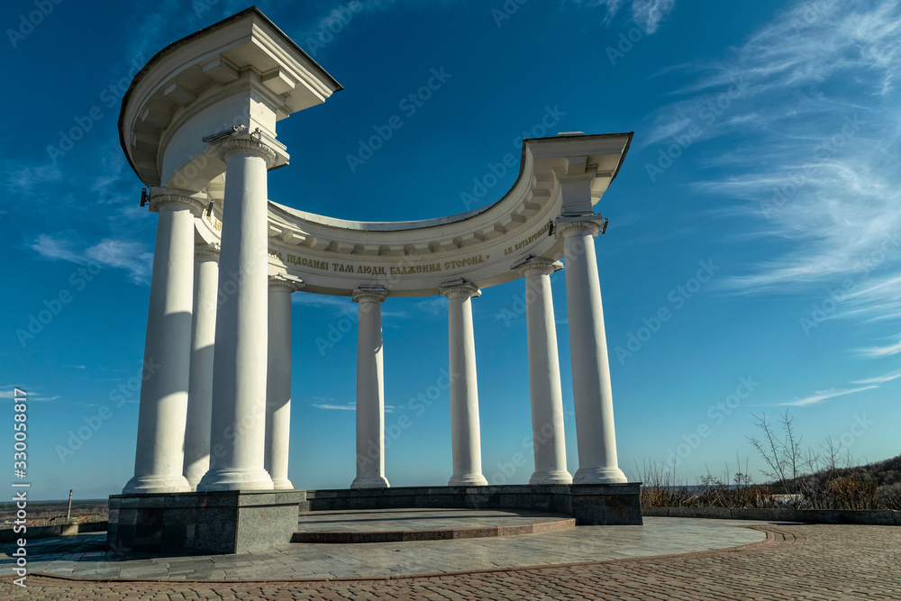 White Arbor in Poltava, Ukraine. White columns and horseshoe