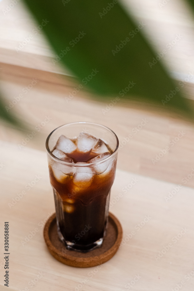 Ice Americano Coffee And ice Glass Wood Background