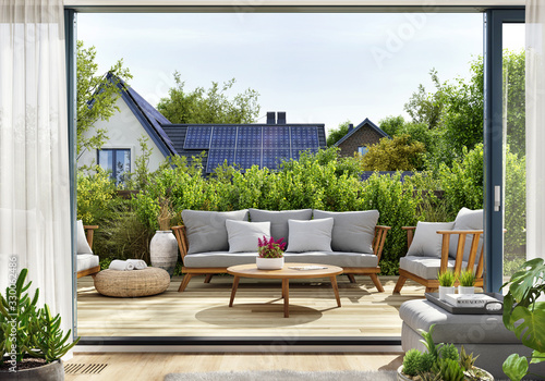 Rooftop patio with sliding doors and house with solar panels photo