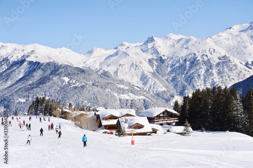 Ski resort with skiing people 