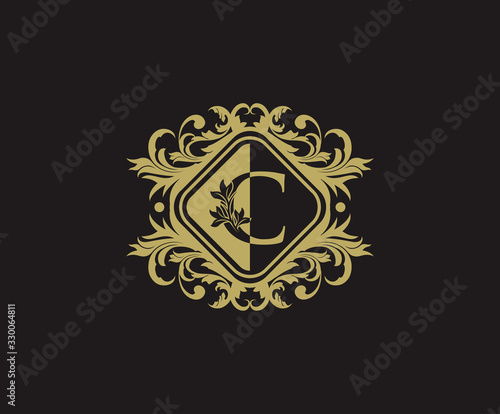 Classic logo design with initial C. Elegant flourishes C Letter. Border carved frame logo template. Vintage vector element.