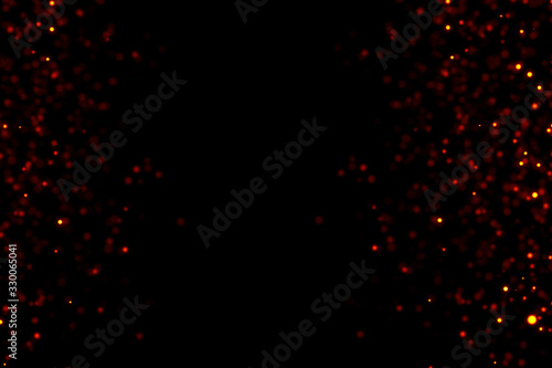 frame of christmas digital glitter sparks golden and red particles vertical strips flowing on black background, holiday event