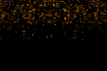 waterfalls of golden glitter sparkle bubbles champagne particles stars on black background,happy new year holiday