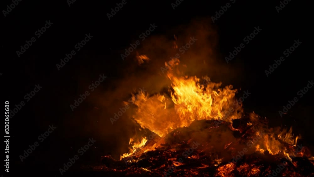 Fires in the forests of Siberia and Amazonia, fire destroys plants trees and animals, a large pile of ash and a burning fire in the night Fires in the forests of Siberia and Amazonia, fire destroys plants trees and animals, a large pile of ash and a burning fire in the night