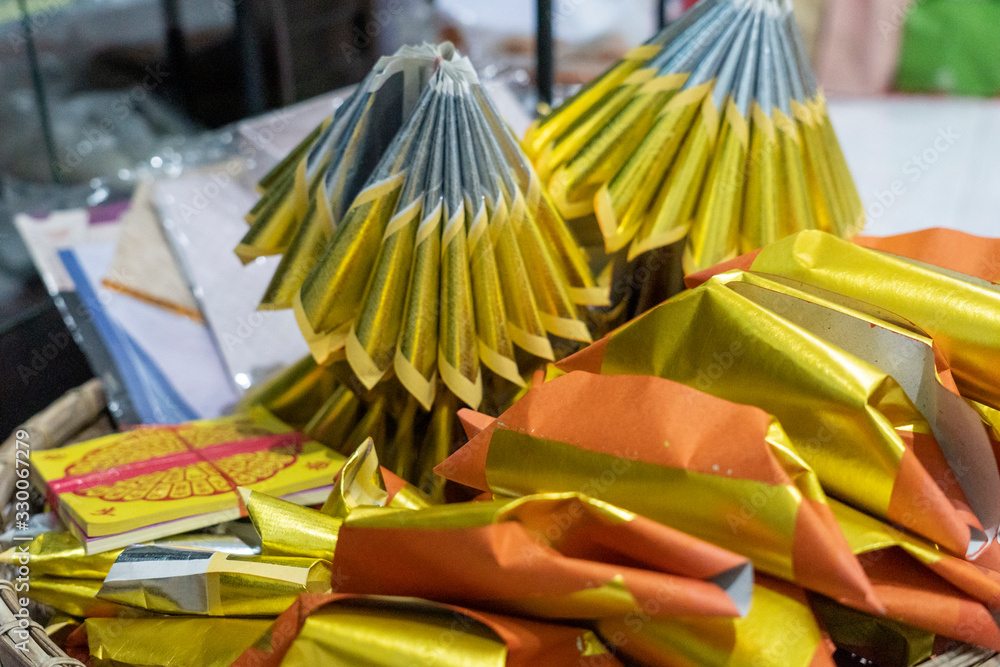 Fototapeta premium Chinese tradition (Paper money, Gold/Silver paper for passed away ancestor's spirits before making offerings for ancestors