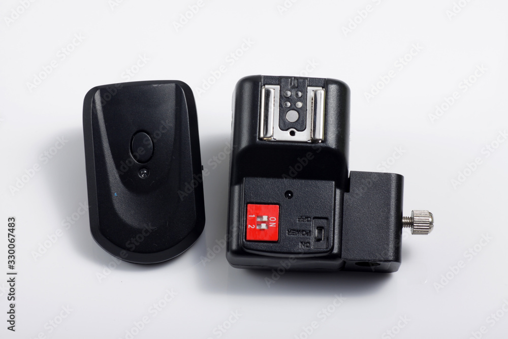 Close up shot of black camera flash trigger isolated on white background