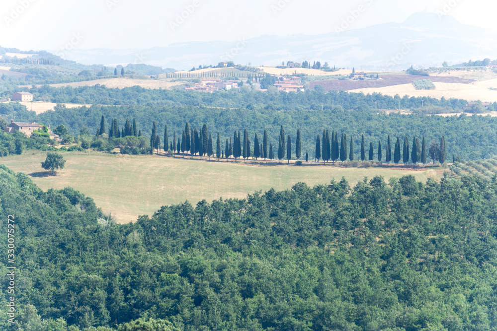 Castelmuzio, an ancient village dating back to the time of the Etruscans, is built on a volcanic limestone hilltop overlooking an amazing landscape Orcia valley Tuscany Italy on July 2019