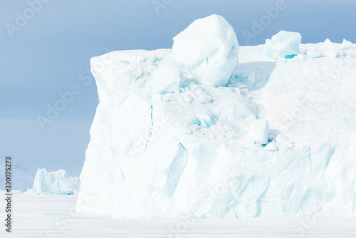 Ice bergs on frozen sea, Greenland.