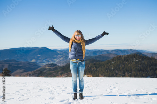Pretty happy women on mountain - global cooling - hiking