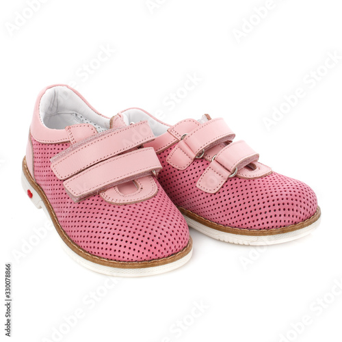 Children's pink shoes for girls isolated on white