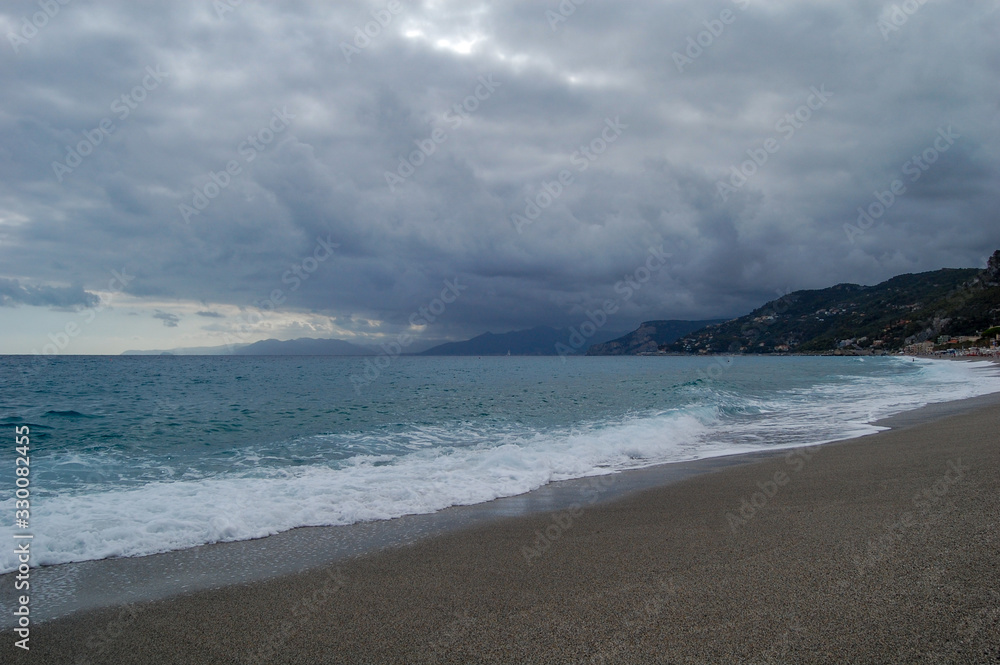 Scenic view of beach and sea during storm in Varigotti, Italy Scenic view of beach and sea during storm in Varigotti, Italy