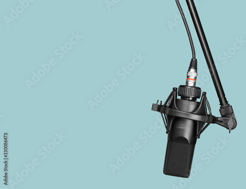 black professional microphone on a stand with clipping path