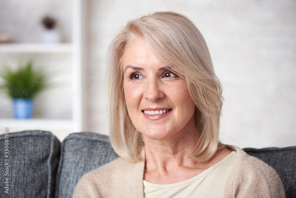 Beautiful old blonde woman is smiling Beautiful old blonde woman is smiling