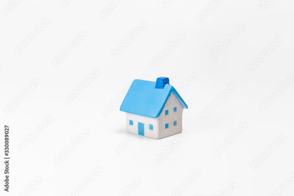 house model over white background, Property investment and house mortgage financial concept house model over white background, Property investment and house mortgage financial concept