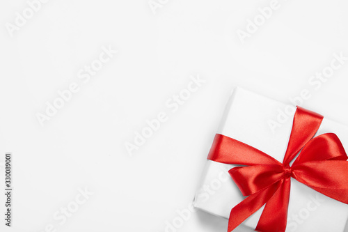 Wallpaper Mural Box with red ribbon and bow isolated on white with copy space. Torontodigital.ca