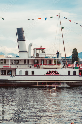 Old Swiss Paddle steamer  on lake Lucerne Switzerland close up paddle detail photo