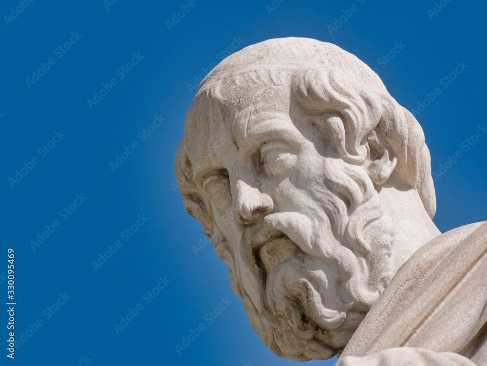 Plato the ancient philosopher marble statue head under blue sky background, Athens Greece