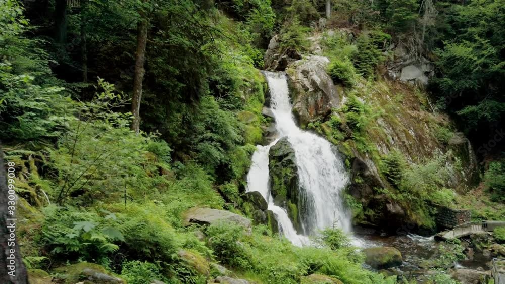 POV Walking toward beautiful waterfall in forest wilderness.Triberg Gutach river waterfall. Power of nature POV Walking toward beautiful waterfall in forest wilderness.Triberg Gutach river waterfall. Power of nature