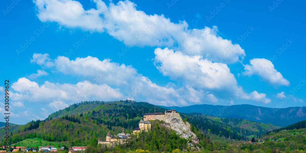 panoram of an Orava Castle on the high steep rock. one of the most beautiful medieval fortress in Slovakia. popular travel destination. beautiful sunny day
