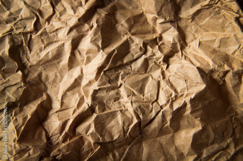 Antique colored paper background texture with dark in old distressed vintage design. Colour of paper beige.