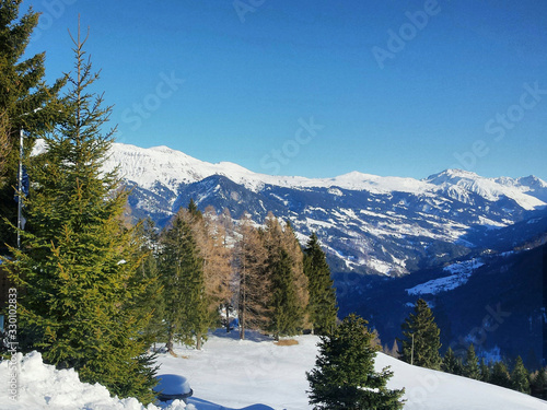 View from a mountain in the Swiss Alps in winter