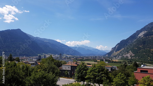 View of the city of Chur, Switzerland, sitting between the mountains of the Alps