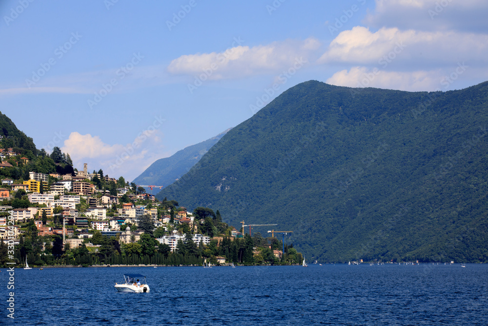 Lugano / Switzerland - June 01, 2019: Lugano lake view, Lugano, Switzerland, Europe Lugano / Switzerland - June 01, 2019: Lugano lake view, Lugano, Switzerland, Europe