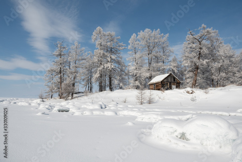Winter landscape with snow covered trees, Lake Baikal, Siberia, Russia © Miller_Eszter