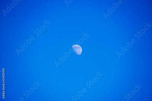 The moon in a blue ski