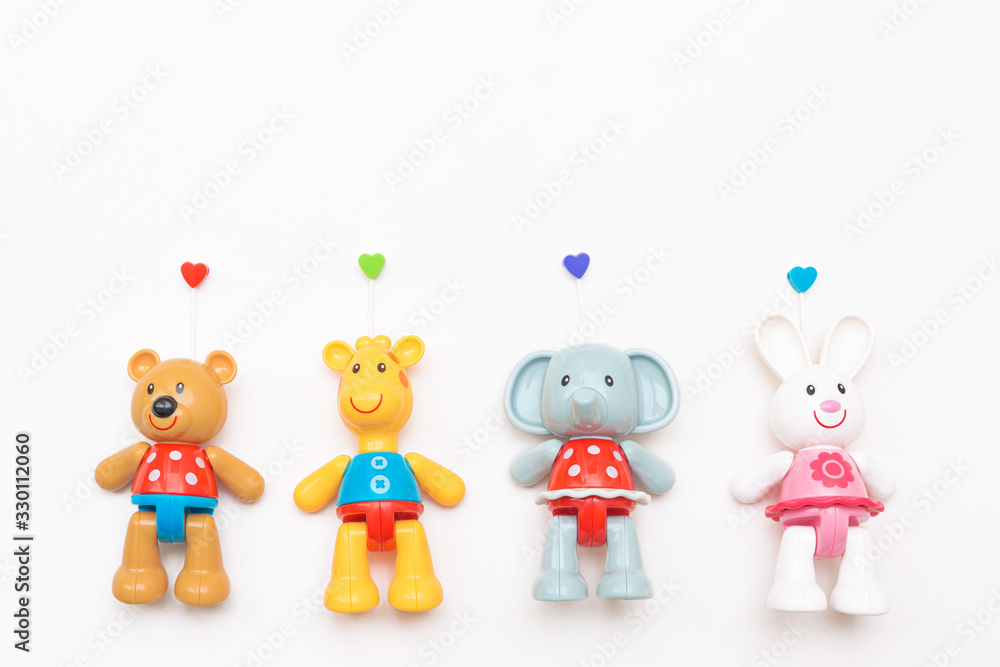 A set of beautiful and bright plastic toys, animals, isolated on a white background