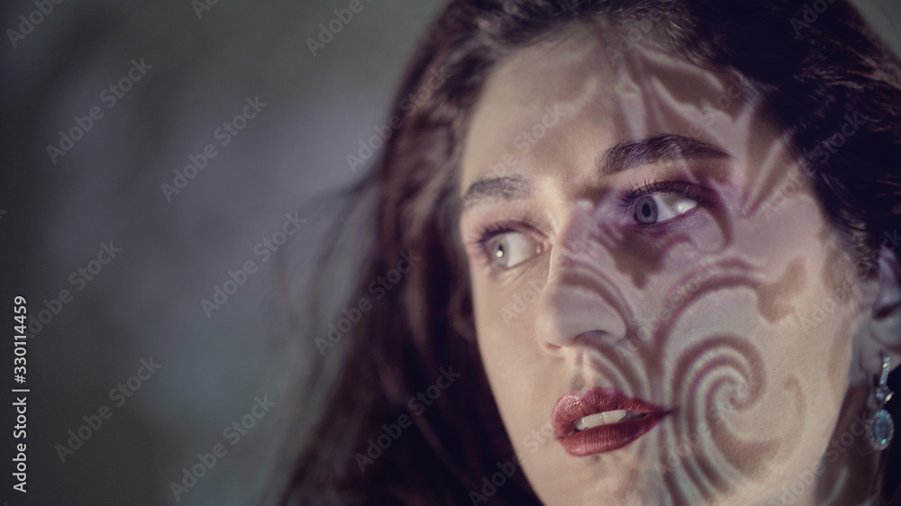 Portrait of a girl with highlights on her face Portrait of a girl with highlights on her face