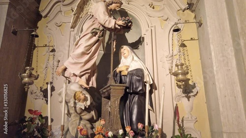 statue of Saint Rita of Cascia, Patroness of Impossible Causes and invoked in case of epidemics like Coronavirus photo