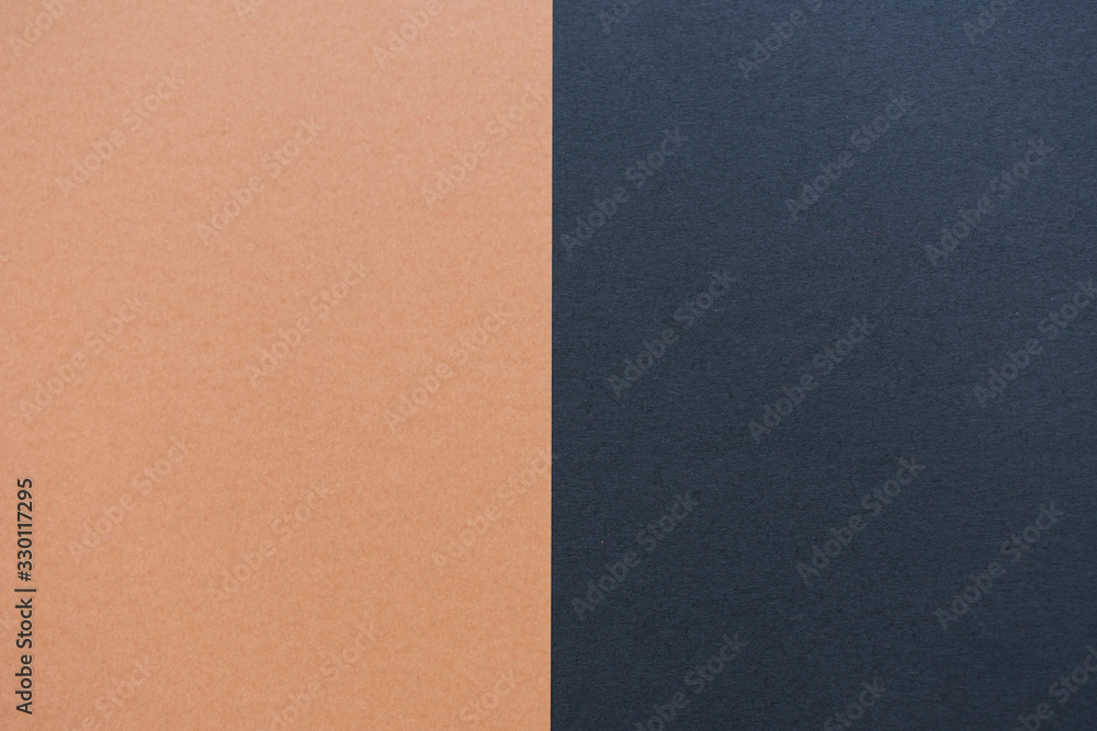 Brown and black cardboard background, vertical division Brown and black cardboard background, vertical division