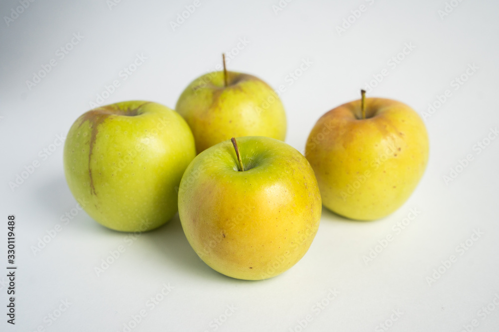 green-yellow apples on a white background. Fruit isolate green-yellow apples on a white background. Fruit isolate