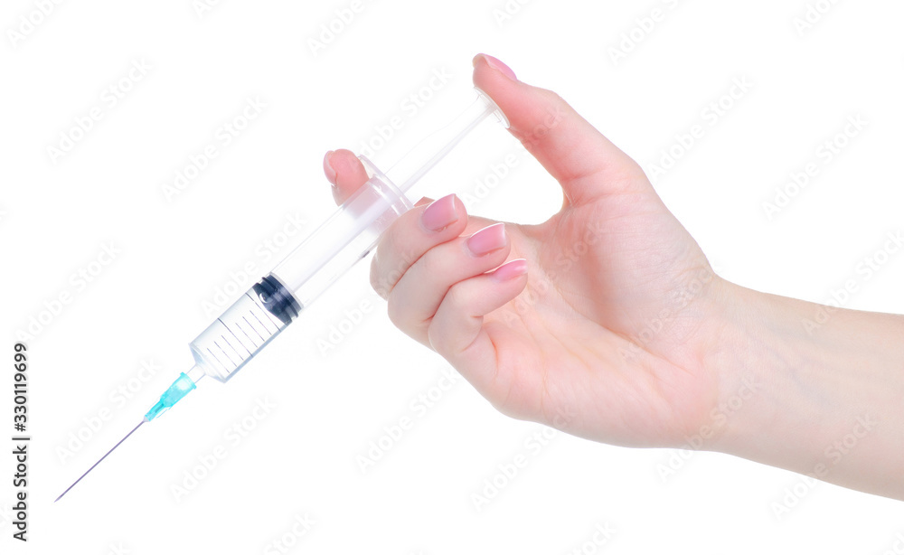 Medicine syringe in hand on white background isolation Medicine syringe in hand on white background isolation