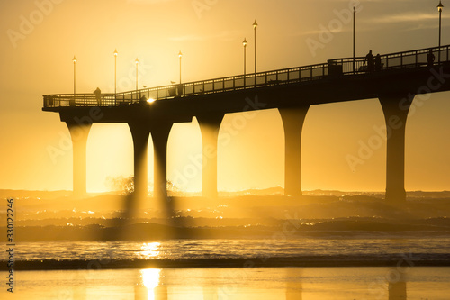 Pier in the sunrise, Christchurch, New Zealand photo