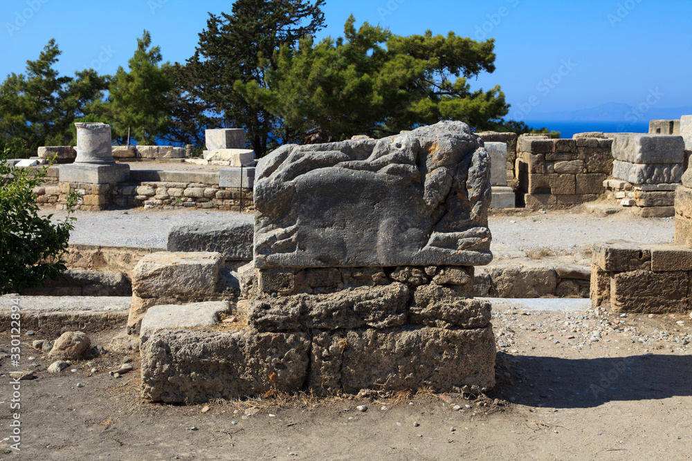 Kamiros, Rhodes / Greece - June 23, 2014: Ancient Kamiros ruins area, Rhodes, Dodecanese Islands, Greece. Kamiros, Rhodes / Greece - June 23, 2014: Ancient Kamiros ruins area, Rhodes, Dodecanese Islands, Greece.