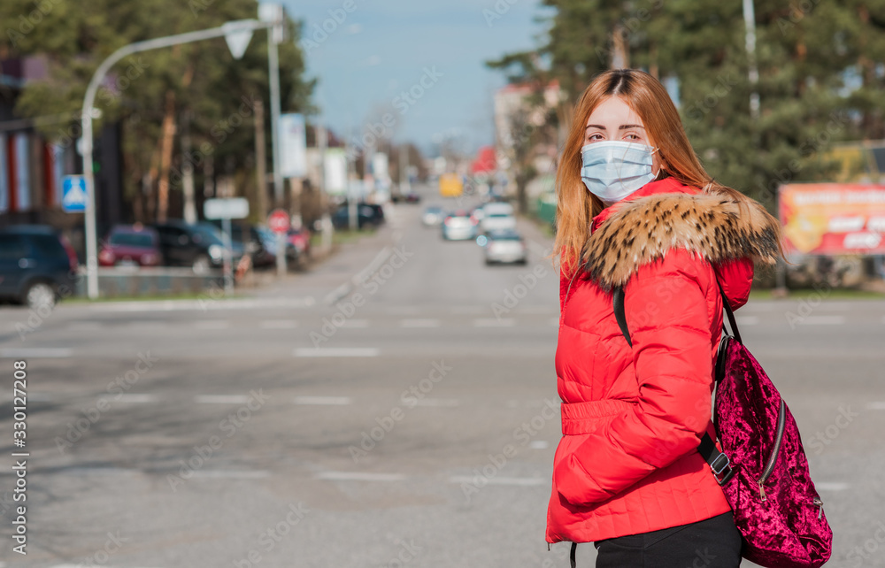 Virus concept. Girl in mask at city, risk for health, pneumonia, quarantine and epidemic Virus concept. Girl in mask at city, risk for health, pneumonia, quarantine and epidemic