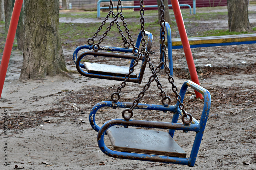 Swing for children in a leisure park. Swing for children in a leisure park.