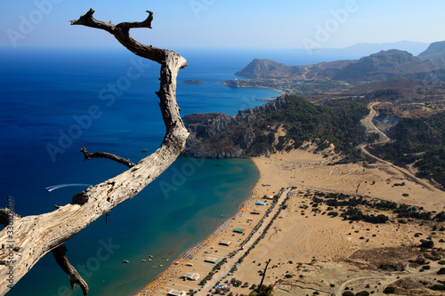 Tsampika, Rhodes / Greece - June 23, 2014: Tsampika beach view and surrounding mountains on the east coast, Rhodes, Dodecanese Islands, Greece......