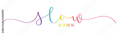 SLOW DOWN vector rainbow-colored brush calligraphy banner with swashes