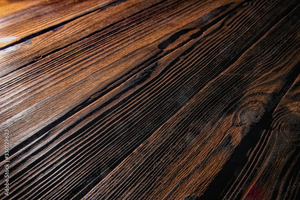 Fototapeta premium a Surface of old textured wooden background tinted