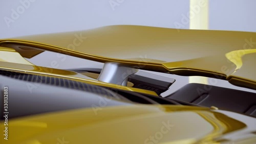 Modern yellow sport supercar active aerodynamic system close up