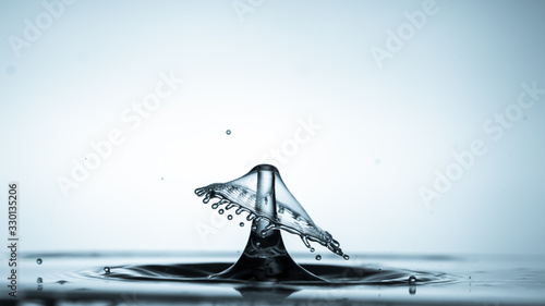 Macro shot of a water drop collision. abstract water splash
