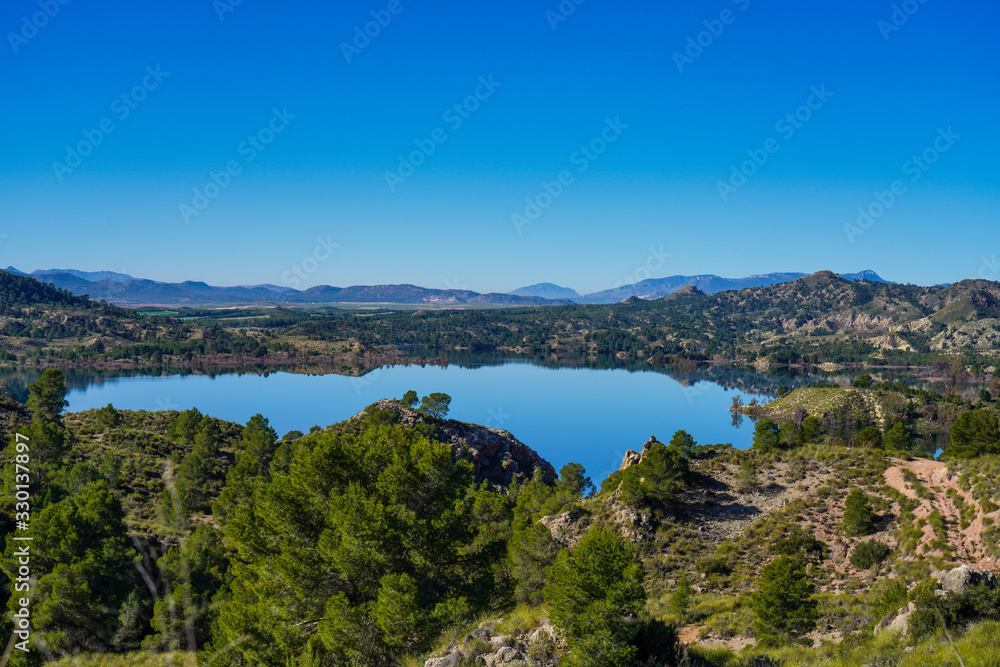 The Pantano Embalse de Alfonso XIII reservoir near Calasparra, Murcia. Spain
