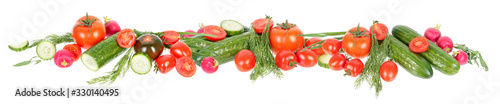 Vegetables border. Fresh green cucumbers, different red tomatoes and bundle of green dill leaves isolated on white background. Ingredients for vegetable salad