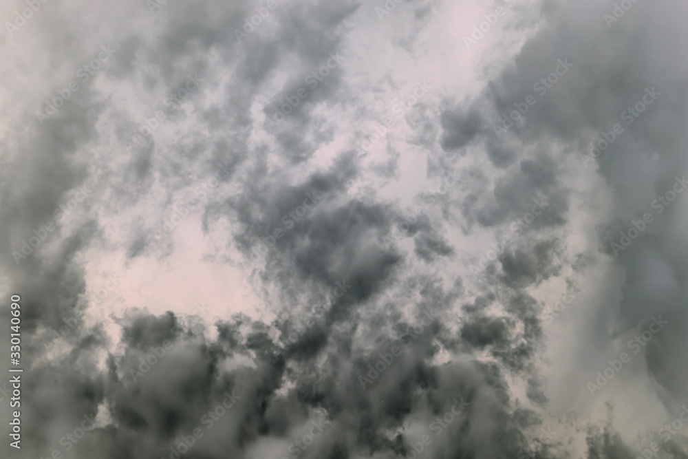 Clouds in the sky. The sun in the clouds. A look through the clouds. The clouds are floating towards the sun. The path to god. Thick steam texture. Thick fog. Sunset soon. High in the sky Clouds in the sky. The sun in the clouds. A look through the clouds. The clouds are floating towards the sun. The path to god. Thick steam texture. Thick fog. Sunset soon. High in the sky