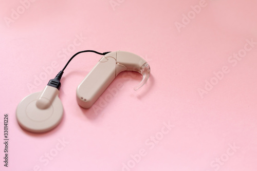 cochlear implant on the arm. hearing aid